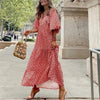 Aviana | Boho Maxi Kleid mit Blumenprint – V‑Ausschnitt & Halbarm im Ibiza‑Look