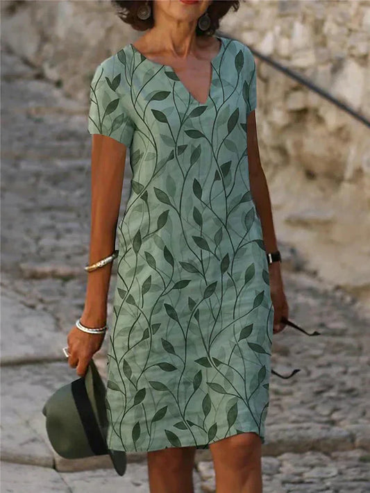 Tessa | V-Ausschnitt Sommerkleid mit Blattmuster | Luftiges Freizeitkleid mit kurzen Ärmeln