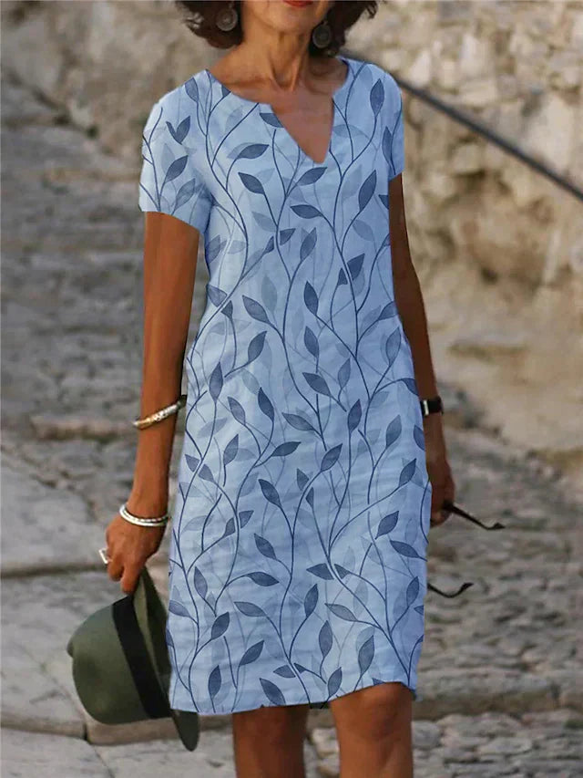 Tessa | V-Ausschnitt Sommerkleid mit Blattmuster | Luftiges Freizeitkleid mit kurzen Ärmeln
