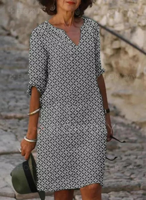 Evie | Elegantes Print‑Kleid mit V‑Ausschnitt – locker & figurschmeichelnd