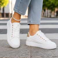 Damen Sneaker Low-Top mit Diamantsteppung und goldfarbenen Ösen